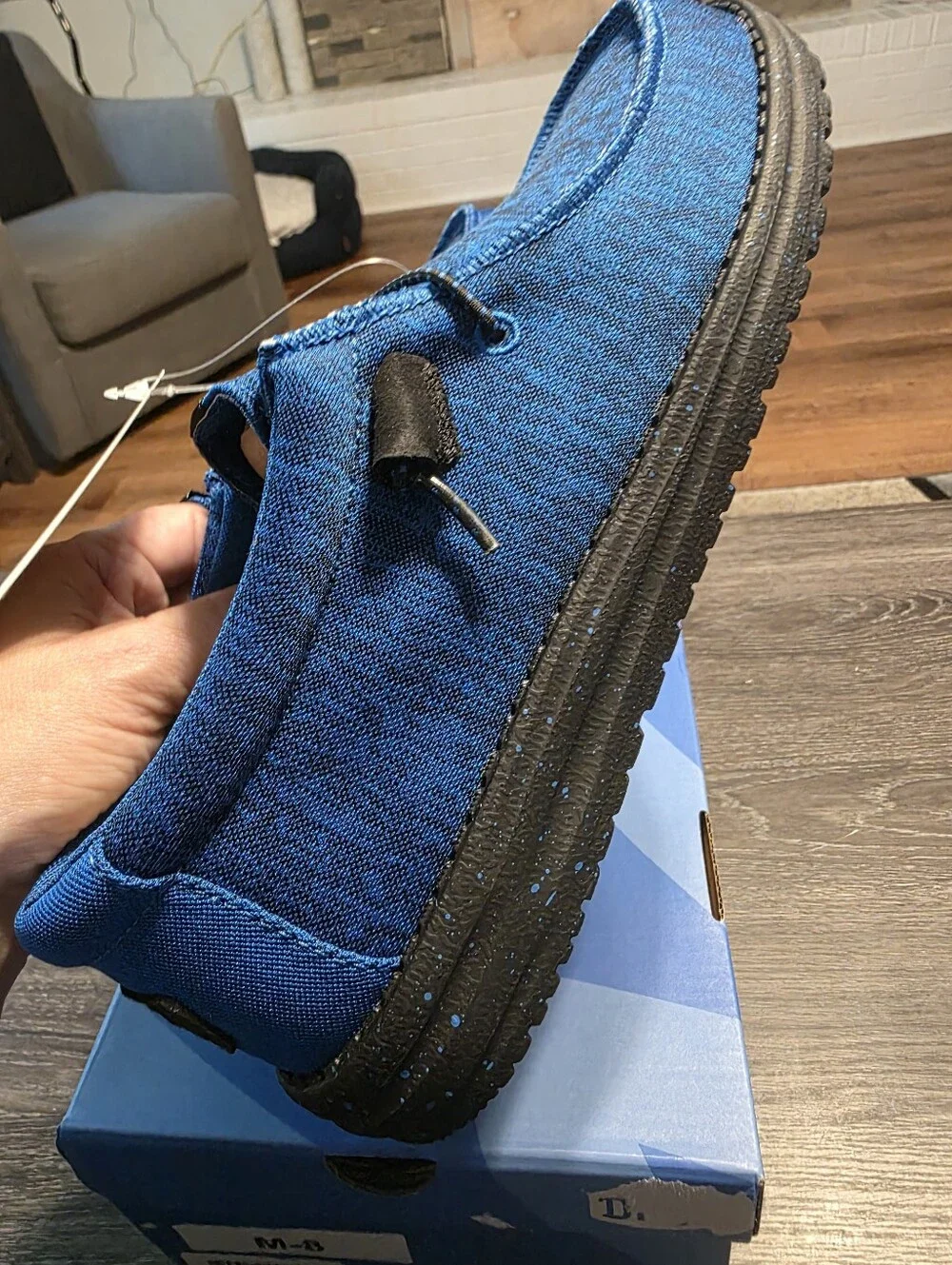 Hey Dude Men's Blue Casual Moccasin Shoes With Black Soles And Logo.